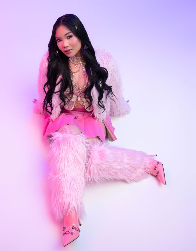 Miche in a pink faux-fur outfit
